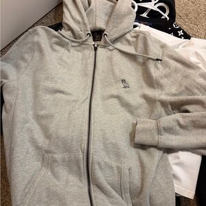 OVO Light Gray Zip Hoodie with Owl Logo